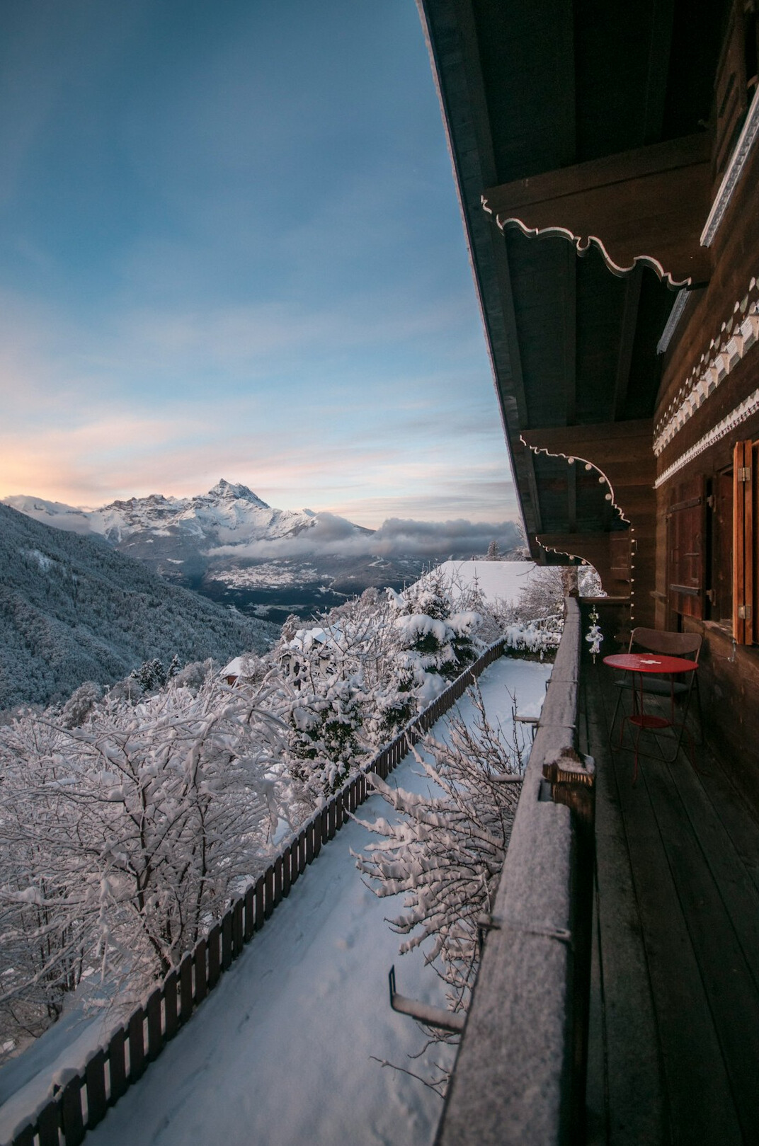 Close-up of a carved wooden balcony on a Swiss chalet